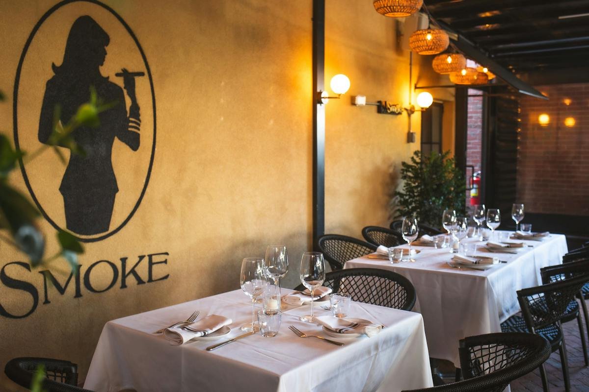Tables set for dining at Sofia in Englewood.