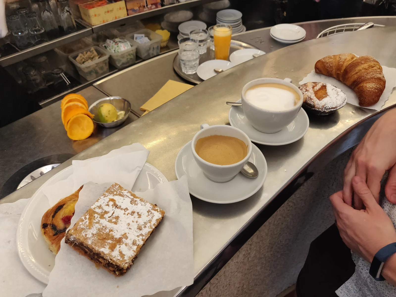 Coffee and pastries on a café counter; illustrative image, not photographed at a Ramsey business.